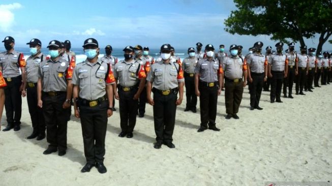 Anggota Satpam ketika mengikuti apel. (Foto: Antara)