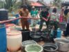 Kodim 1006 Banjar Distribusi Air Bersih di Desa Pindahan Baru